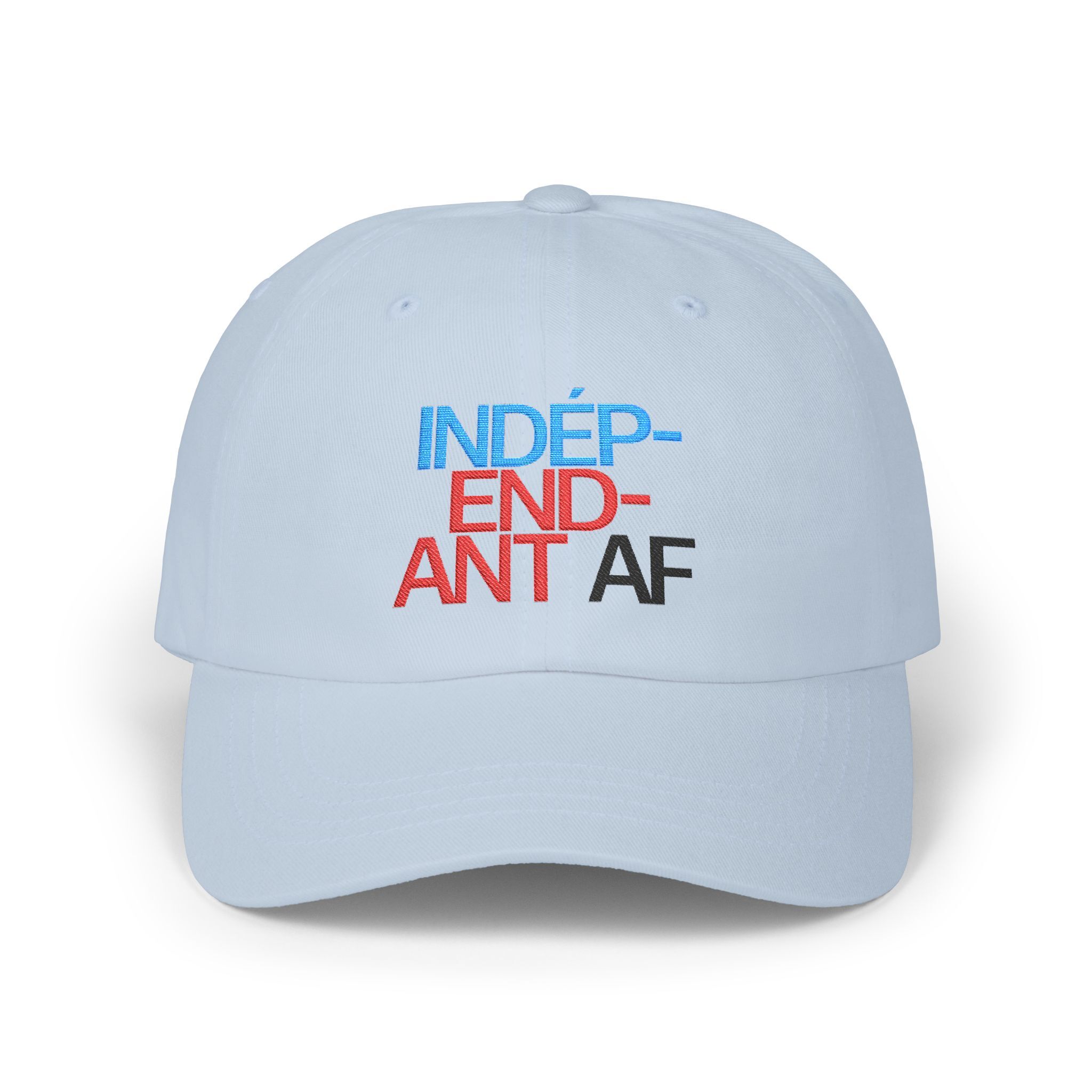 Show your style with the Macrons Secret Weakness Baseball Cap—a light blue cap featuring INDÉPENDANT AF embroidered on the front in blue, red, and black letters.