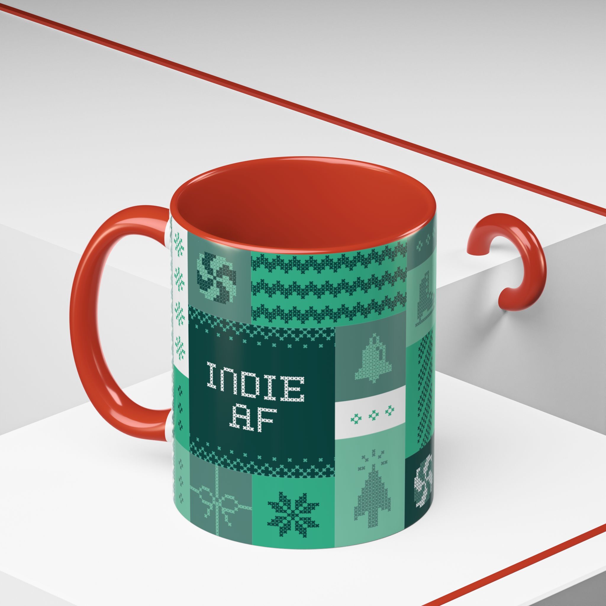 The "Mandatory Fun" Mug - Green | 11oz Indie AF 2025 Holidays by Grown features a red handle, red interior, and green pixel art—perfect for holiday fun. Displayed on a white surface with red lines.