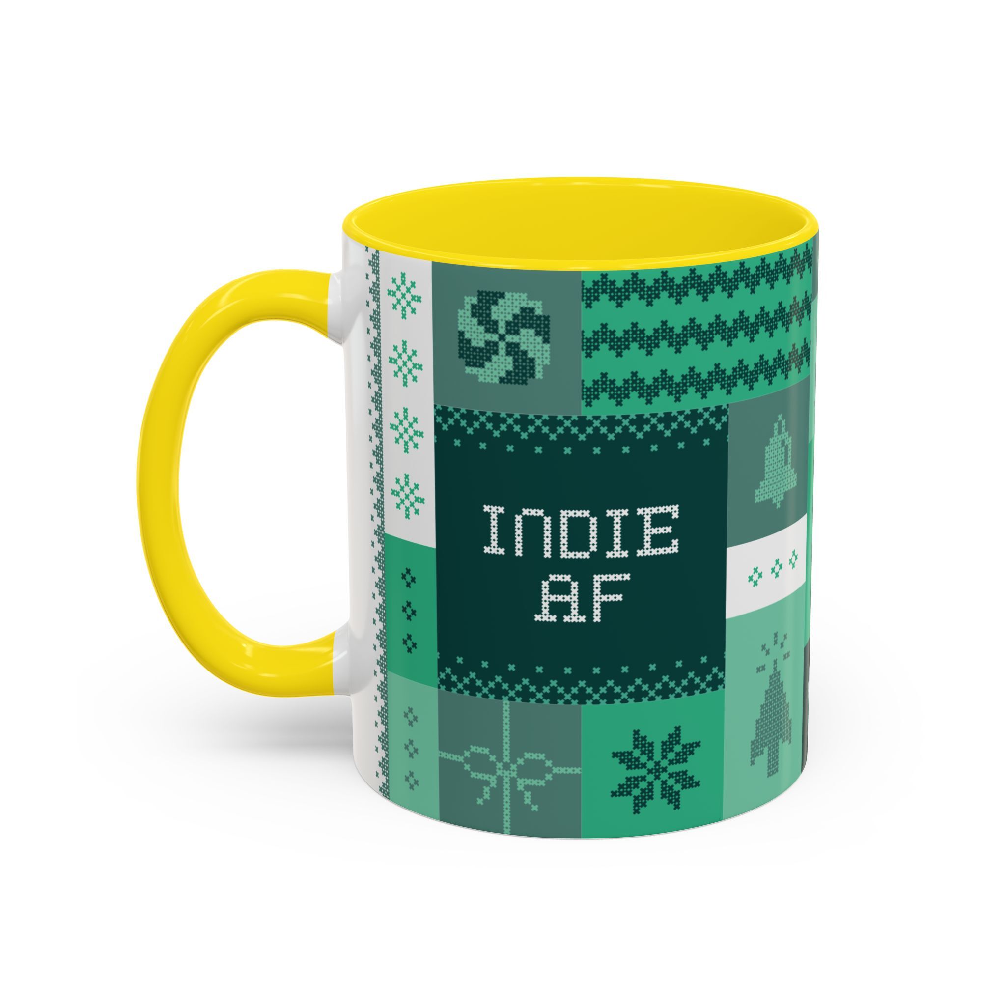 Sip from The "Mandatory Fun" Mug - Green, an 11oz ceramic Indie AF 2025 Holidays mug by Grown with a yellow handle, yellow interior, and green & white pixel art plus INDIE AF text—perfect for holiday cheer.