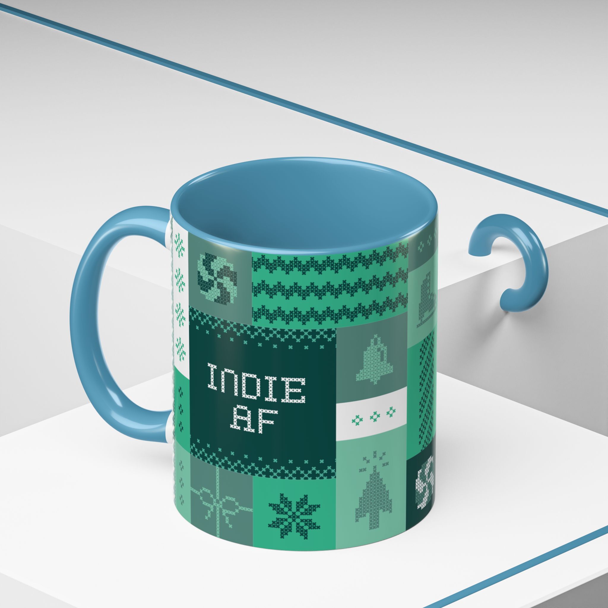 A green "Mandatory Fun" Mug (11oz) by Grown, Indie AF 2025 Holidays edition, features a knit-pattern design—perfect for sipping during the holidays or adding some fun to your daily routine.