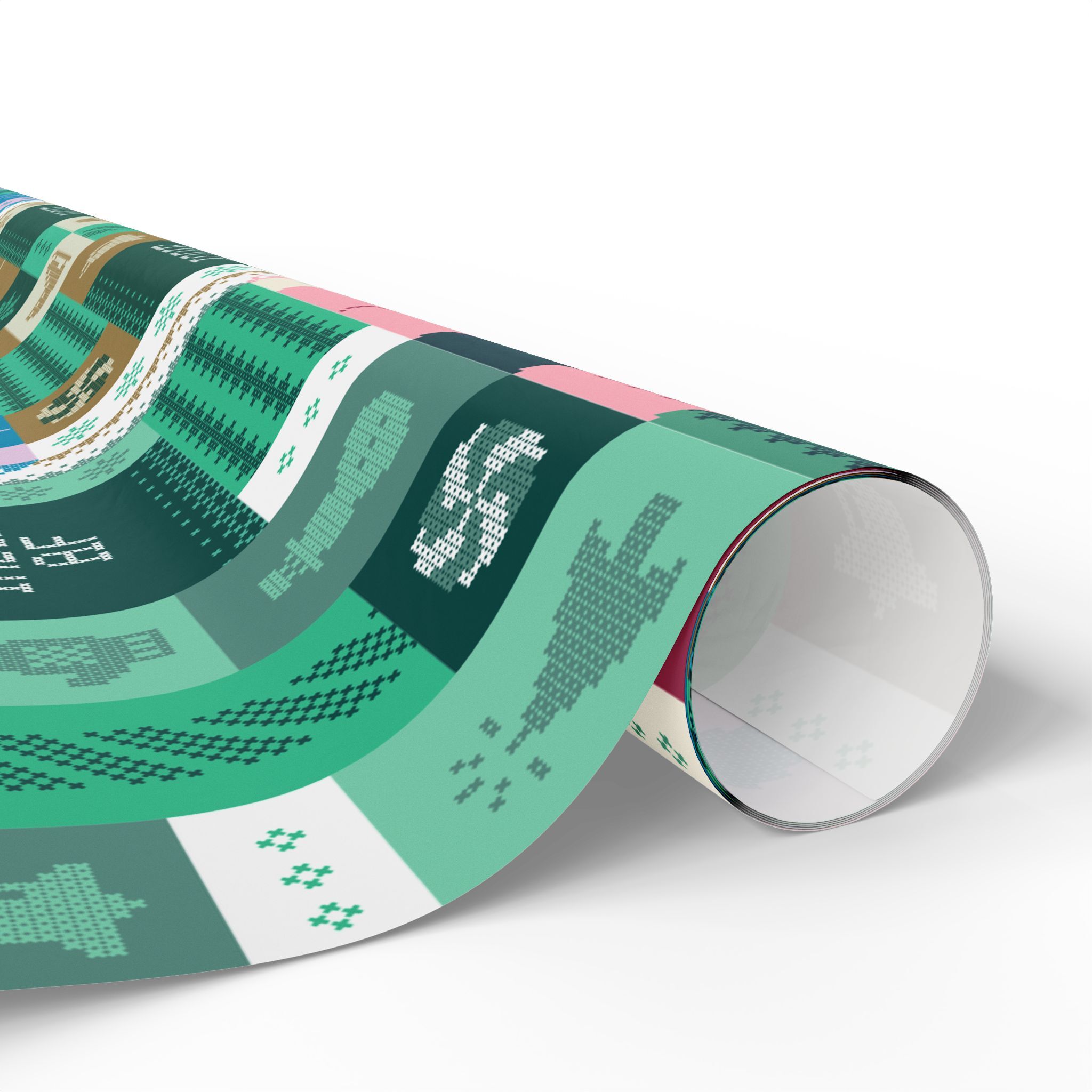 A close-up of "Ship It" Wrapping Paper | Indie AF 2025 Holidays by Grown, rolled to reveal green and multicolored pixel art holiday designs.