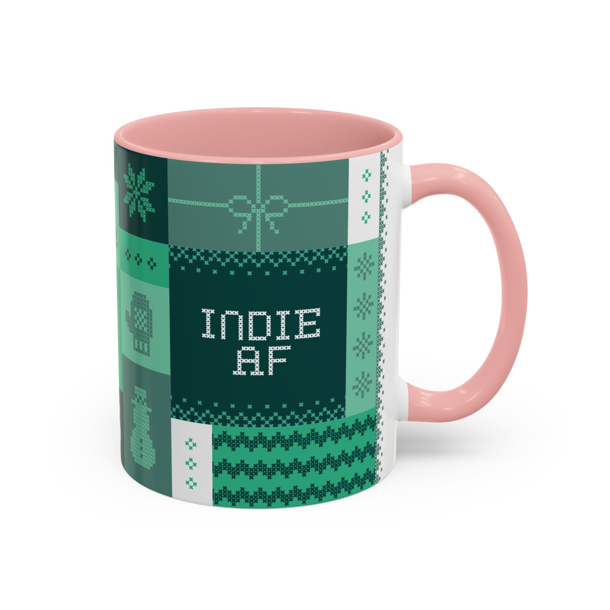 The "Mandatory Fun" Mug - Green | 11oz Indie AF 2025 Holidays by Grown features a green knitted pattern and INDIE AF text, with a pink handle and interior—perfect for your 2025 holiday coffee breaks.
