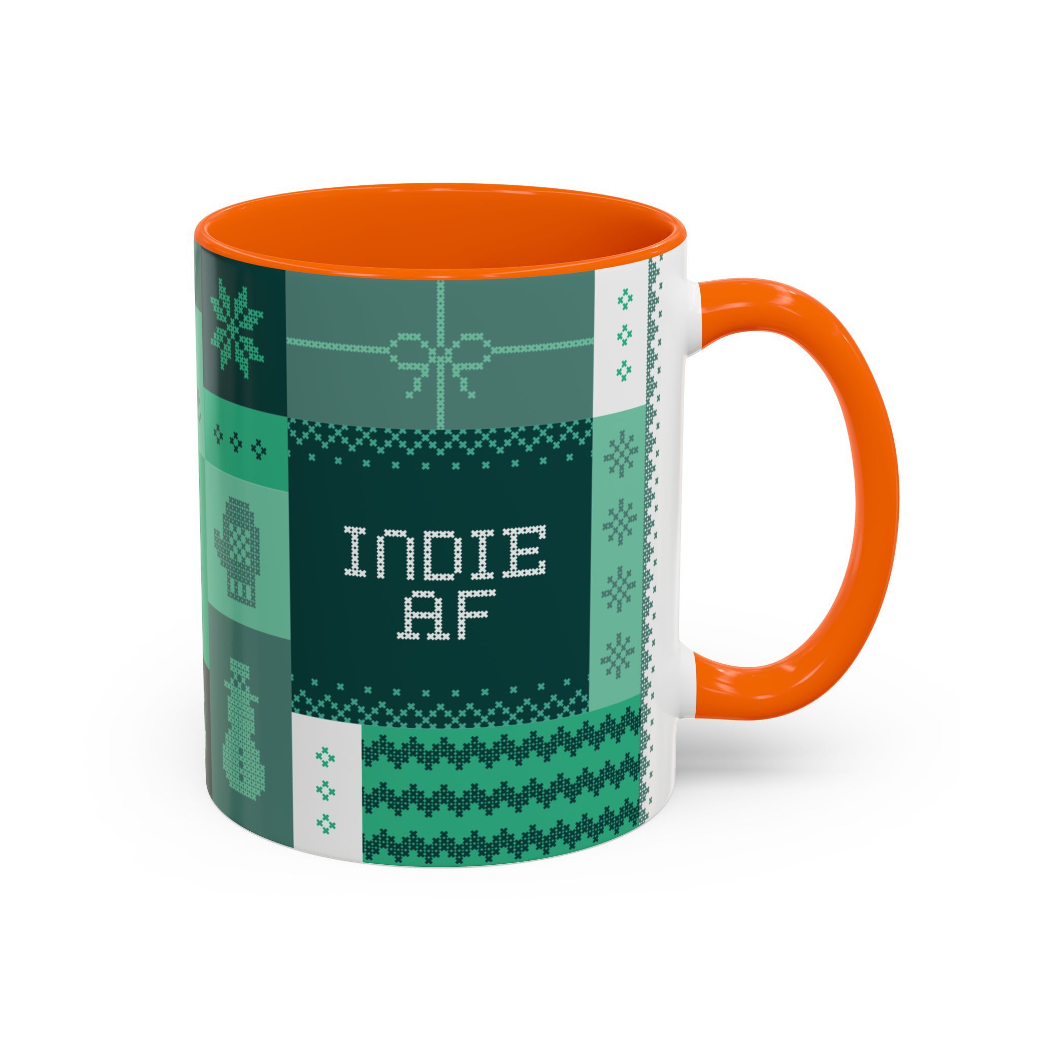 The "Mandatory Fun" Mug - Green | 11oz Indie AF 2025 Holidays by Grown is a ceramic mug with an orange handle and interior, green and white knit pattern, and INDIE AF text—perfect for your 2025 holiday celebrations.