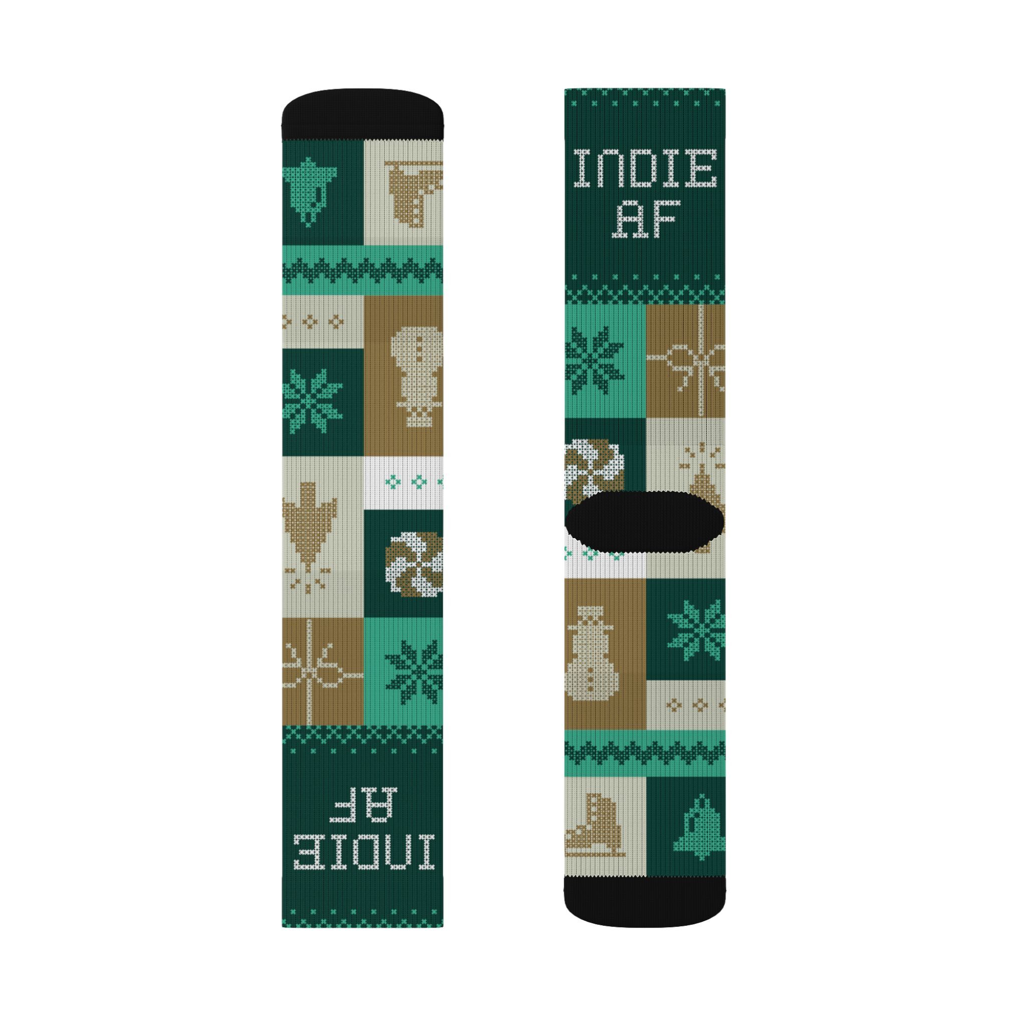 The "Cold Feet" Socks - Gold by Grown feature pixel art icons, green, brown, and beige tones, and INDIE AF text at the top. Part of the Indie AF 2025 Holidays collection.