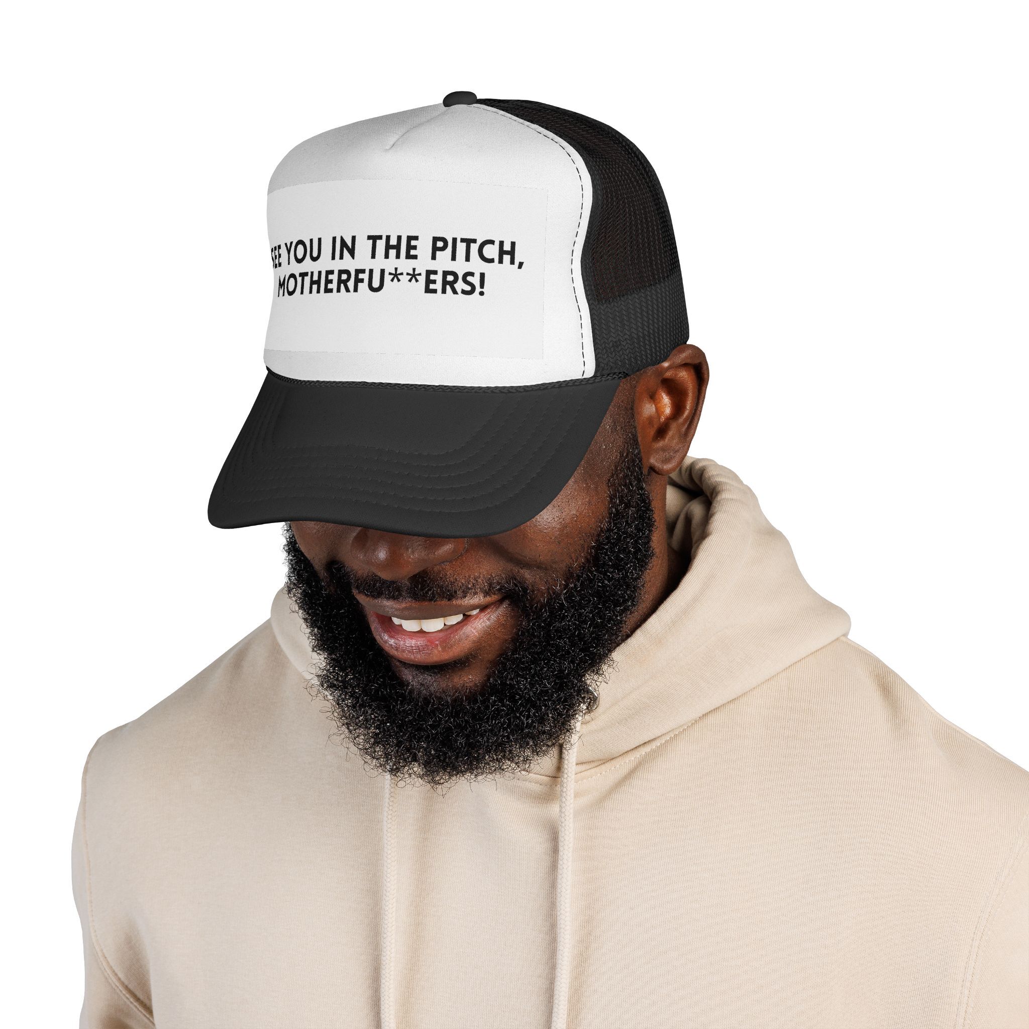 A man sports The "See You in the Pitch, Motherfu**ers!" Trucker Hat along with a beige hoodie, boldly showcasing the hat’s statement text on the front.
