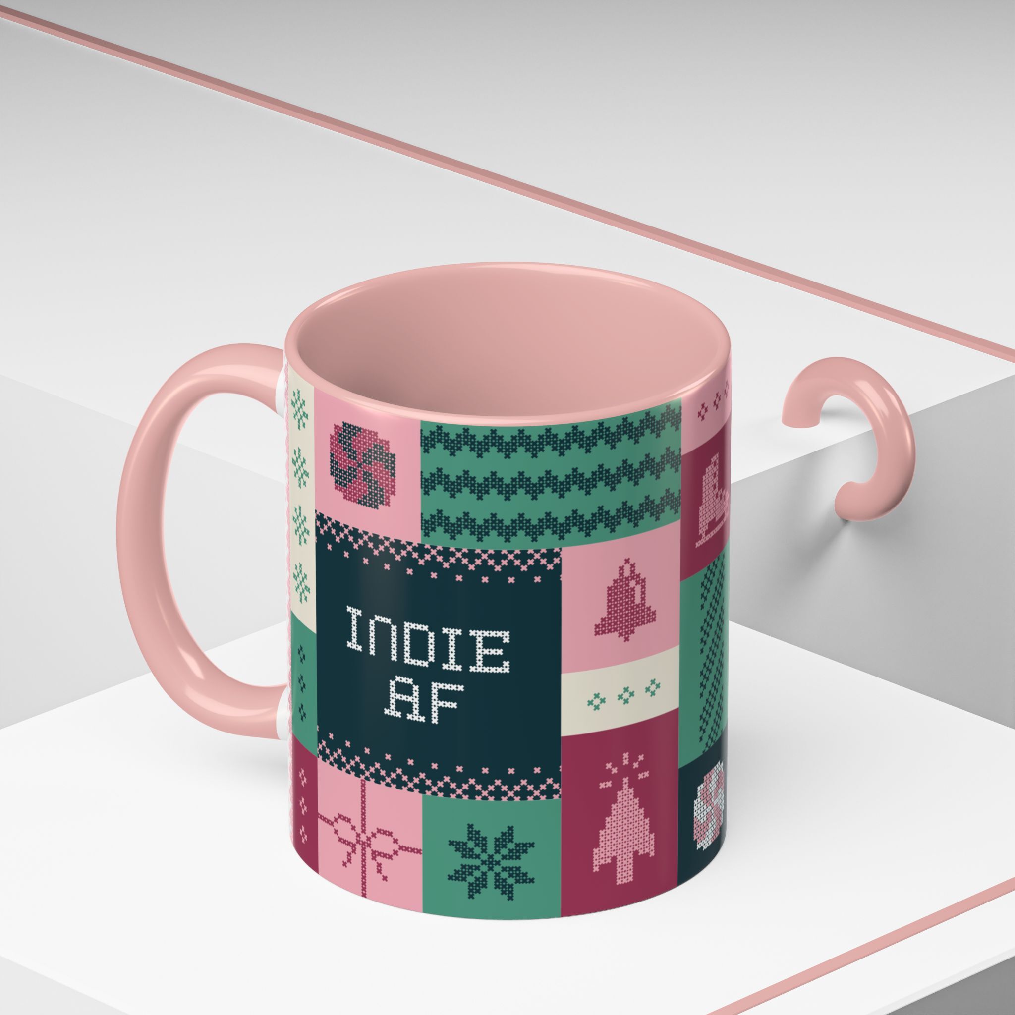Sip in style with The "Mandatory Fun" Mug - Pink | 11oz Indie AF 2025 Holidays by Grown, featuring pixel art patches and bold white "INDIE AF" text—a quirky mug for anyone who lives for mandatory fun in 2025.