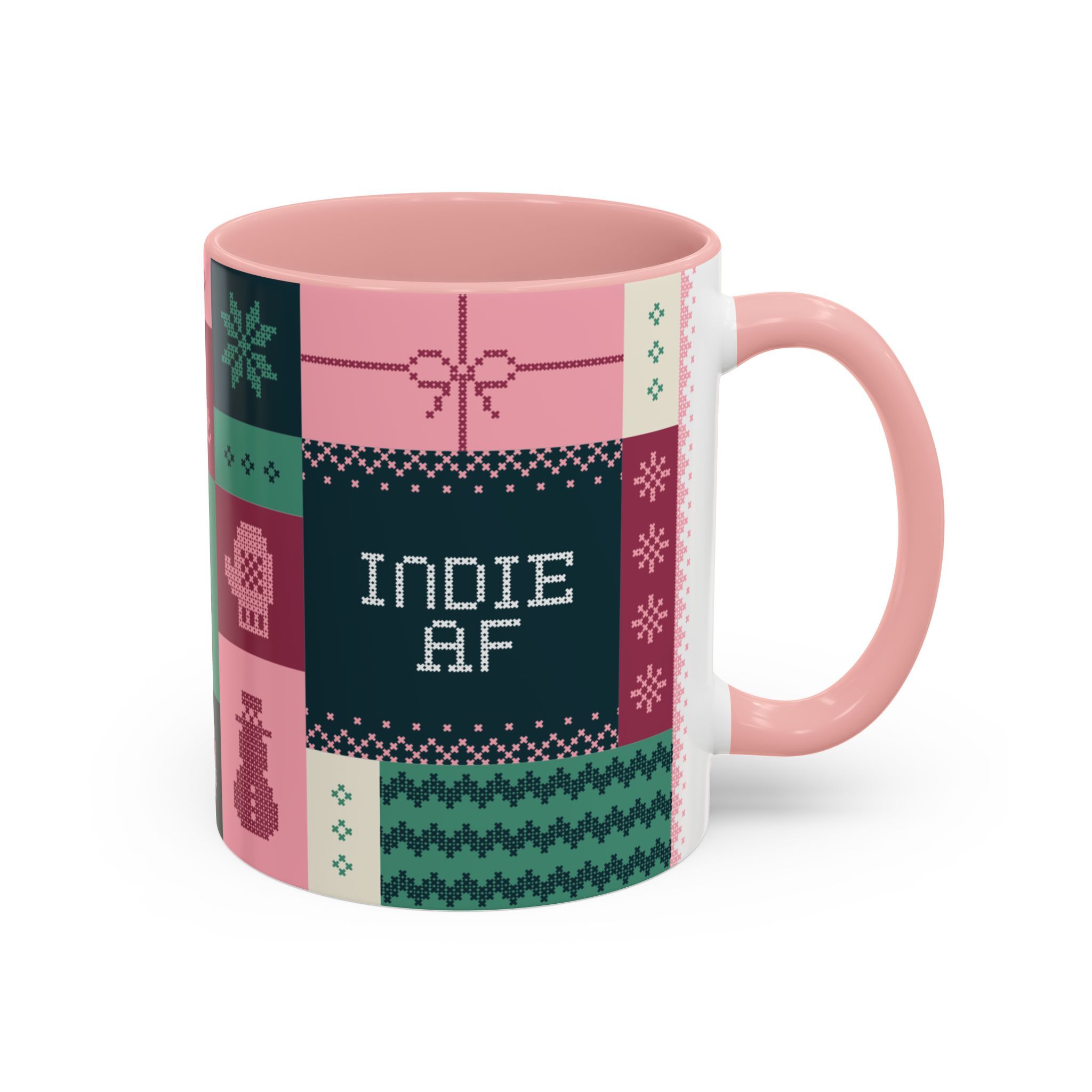 The "Mandatory Fun" Mug - Pink | 11oz Indie AF 2025 Holidays by Grown features a handle, patchwork pattern, and “INDIE AF” in cross-stitch style—perfect for your Grown Holidays 2025 gatherings.
