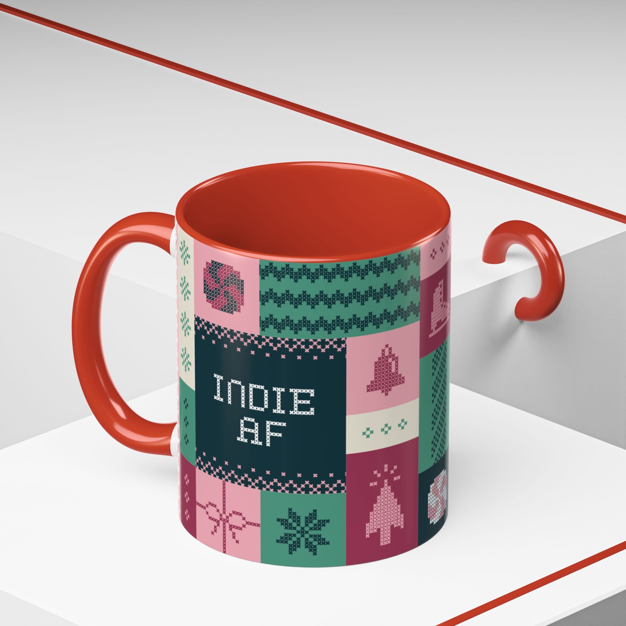 The "Mandatory Fun" Mug - Pink | 11oz features a colorful patchwork design and the phrase INDIE AF—perfect for celebrating the 2025 Holidays in style. Designed by Grown.