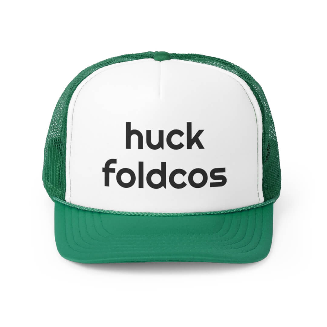 The Foldcos Trucker Hat is a green and white cap with huck foldcos printed in bold black letters on the front panel.