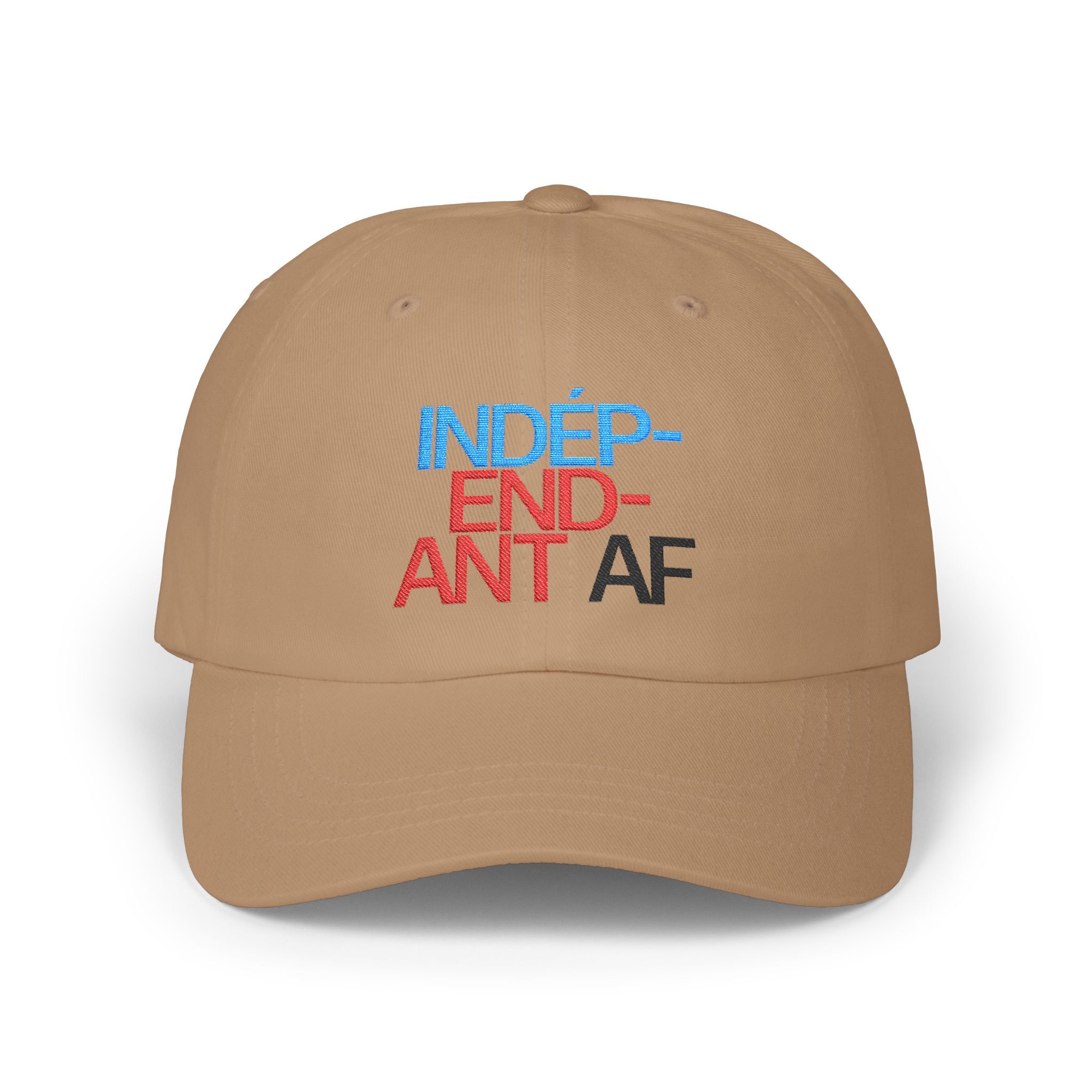 The Macrons Secret Weakness Baseball Cap is a tan hat featuring INDÉPENDANT AF with a bold macron over the É, embroidered in blue, red, and black on the front—a subtle nod to embracing your secret weakness.