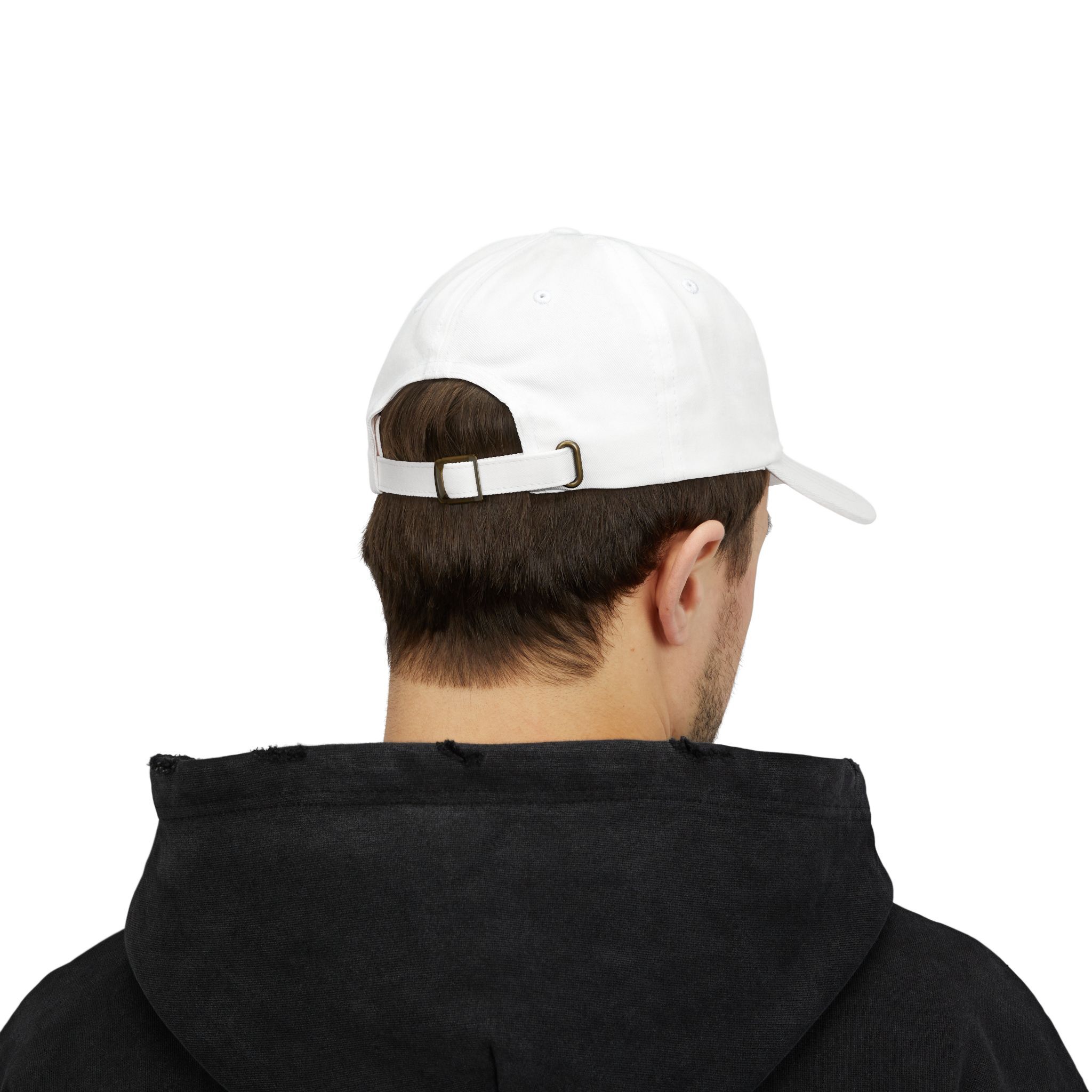 A person is shown from the back wearing the Macrons Secret Weakness Baseball Cap in white and a black hoodie, their secret weakness hidden from view.