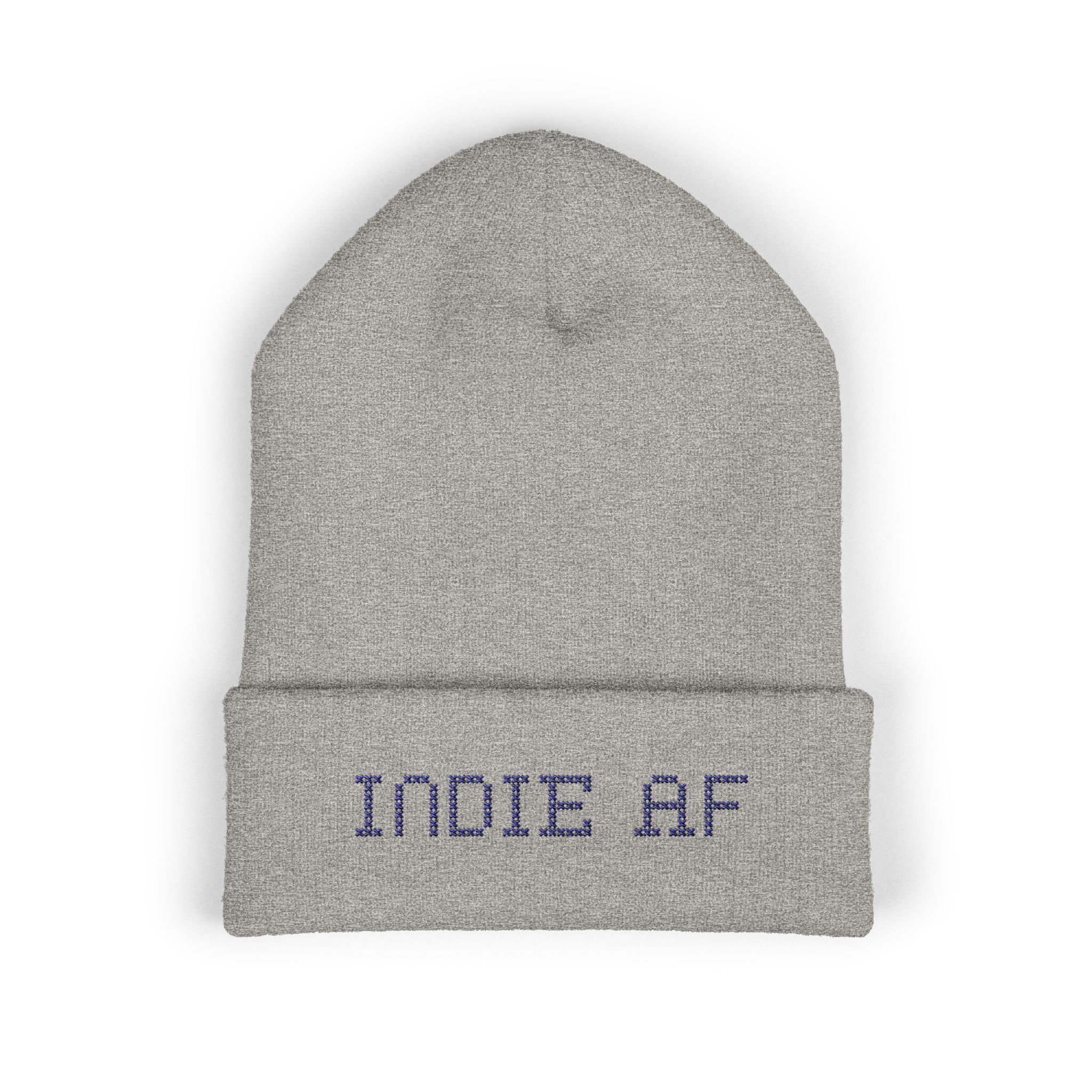 Keep cozy in style with the Indie AF 2025 Holidays by Grown: Cuffed Beanie | Dark Embroidery, a light gray beanie featuring INDIE AF embroidered in dark blue on the cuff—ideal for your Holidays 2025 look.